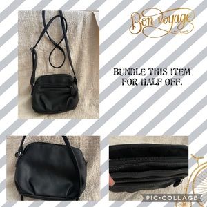 Black vegan leather crossbody purse. Like New. zippered pockets. Gr8t 4 travel